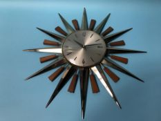 A Metamec battery Sunburst wall clock