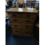 An Edwardian chest of drawers, with two short and three long graduated drawers, 99cm wide