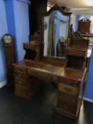 An Edwardian mahogany dressing chest, 136cm wide