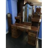 An Edwardian mahogany dressing chest, 136cm wide