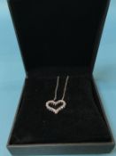 An 18ct white gold 'Heart' pendant, mounted with diamonds, 4.5g