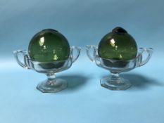 Two green glass witches balls and two glass dishes