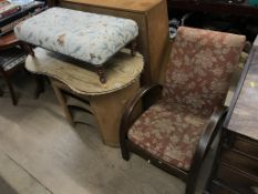 An oak decorative armchair, dressing table and stool