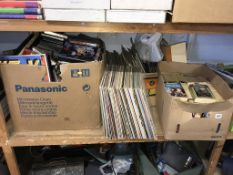A shelf of assorted, to include LPs, Vintage video games etc.