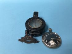 A military compass and pocket watch