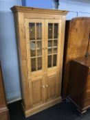A pine double door cabinet
