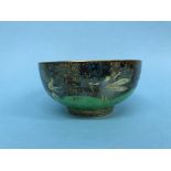 A small Wedgwood Fairyland lustre bowl 'Leap Frogging Elves', pattern number 74968, by Daisy