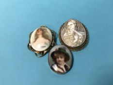 A 9ct gold mounted cameo brooch and two others