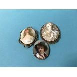 A 9ct gold mounted cameo brooch and two others