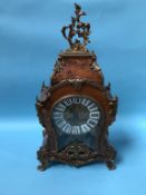 A modern walnut cased bracket clock, with gilt mounts and enamelled numerals, eight day movement and
