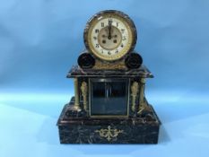 A veined marble eight day bracket clock, with cream dial, numerals and strike action, 49cm height