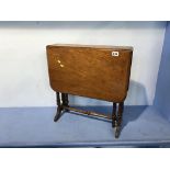 A small mahogany drop leaf table