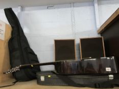 Two guitars, a violin and a pair of speakers