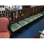 A set of six Edwardian mahogany chairs