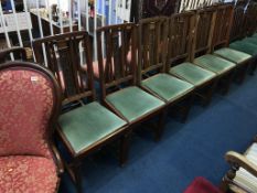 A set of six Edwardian mahogany chairs