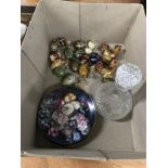 A collection of trinket boxes, collectors plates and a decanter