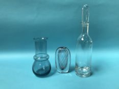 A Wedgwood clear glass decanter, a Kosta cased glass vase and another glass vase (3)