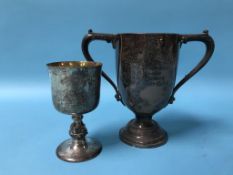 A silver trophy and a silver cup, 18oz