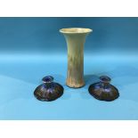 A Ruskin vase, dated 1930 and a pair of Ruskin style candlesticks