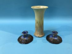 A Ruskin vase, dated 1930 and a pair of Ruskin style candlesticks