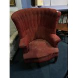 A tub wing armchair