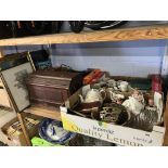 A shelf of assorted, to include a sewing machine