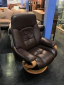 A Himolla brown leather armchair