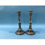 A pair of telescopic silver plated candlesticks