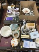 Four trays of assorted china, to include Royal Doulton and Lladro