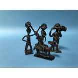 A collection of four brass 'Benin' figures