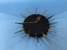 A Sunbury stylised electric wall clock, 30cm diameter