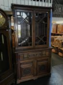 An Edwardian walnut secretaire bookcase