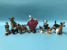 A Royal Doulton figure 'Delight', four Doulton dogs and three Royal Worcester dogs etc.