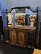 A fine quality Victorian walnut mirror back credenza, in the manner of Gillows, the mirror back