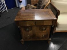 A reproduction mahogany Empire style chest of drawers