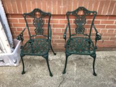 A pair of garden chairs