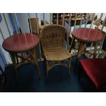 A pair of basket weave tables and a chair