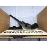 A digital guitar and a Kawai keyboard