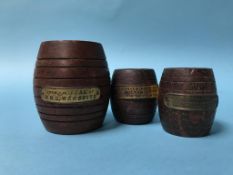 Three turned teak pots, made from the timbers of the Mauretania, HMS Warspite and HMS Victory