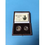 A boxed Britannia two coin set proof, weight 1/4 8.513 grams, weight 1/10 3.412 grams