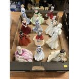 A collection of twelve figures, Royal Worcester and Royal Doulton etc.