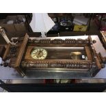 A walnut cased Vienna wall clock