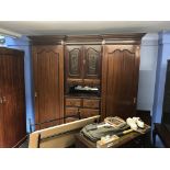 An Edwardian triple door wardrobe