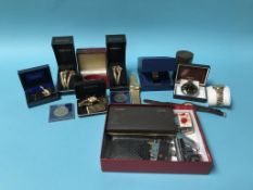 A collection of various wristwatches and novelty lighters etc.