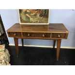 A walnut three drawer side table