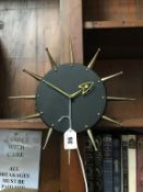 A Sunbury vintage metalwork Sunburst electric wall clock