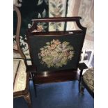 A Campaign writing desk, ebonised chair and mahogany fire screen