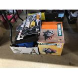 A box of assorted and a Black and Decker saw