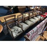 A set of marquetry inlaid Edwardian dining chairs