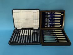 Cased fruit knives and forks and a cased set of fish knives and forks